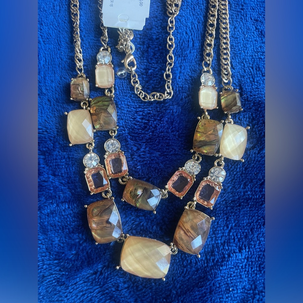 Napier gold tone necklace with amber and earth tone colored stones. Nickel free.